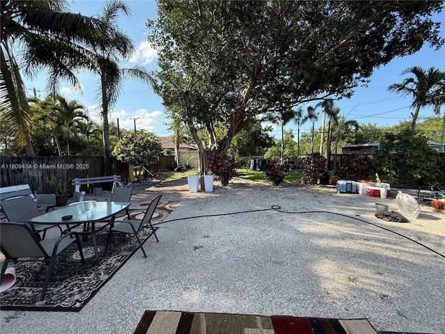 7951 NW 30th St, Davie, FL 33024 - fenced backyard with a patio and outdoor dining space