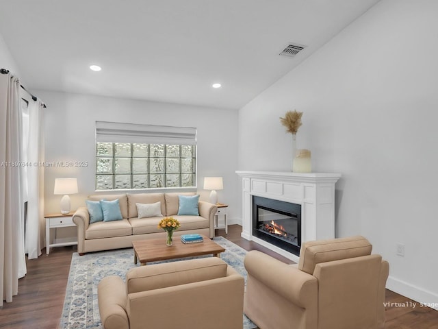 17654 SW 5th Ct, Pembroke Pines, FL 33029 - living area with wood finished floors, a glass covered fireplace, recessed lighting, and baseboards