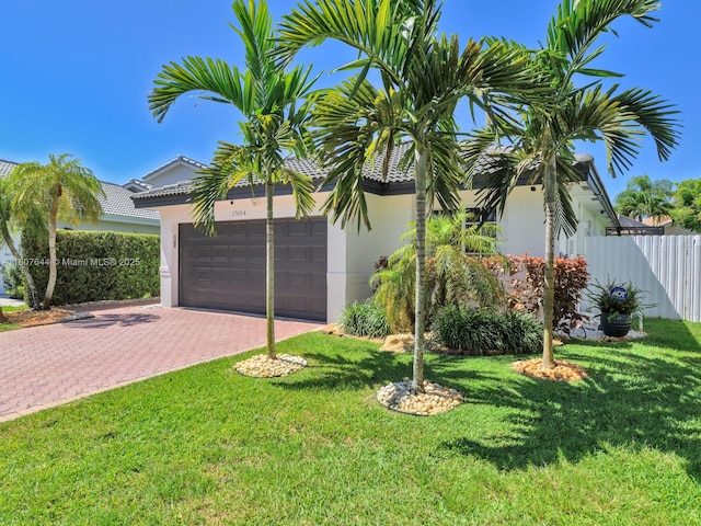 17654 SW 5th Ct, Pembroke Pines, FL 33029 - view of front facade with decorative driveway, a garage, stucco siding, and a tile roof
