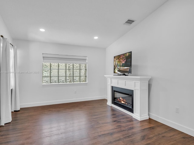 17654 SW 5th Ct, Pembroke Pines, FL 33029 - unfurnished living room with a glass covered fireplace, dark wood finished floors, baseboards, and recessed lighting