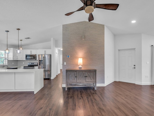 17654 SW 5th Ct, Pembroke Pines, FL 33029 - living room featuring lofted ceiling, a ceiling fan, dark wood-type flooring, and baseboards