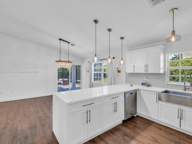 17654 SW 5th Ct, Pembroke Pines, FL 33029 - kitchen with dishwasher, a sink, a peninsula, tasteful backsplash, and dark wood-type flooring