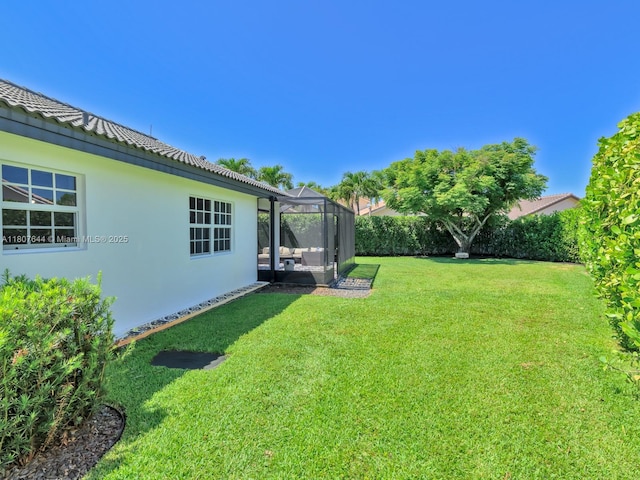 17654 SW 5th Ct, Pembroke Pines, FL 33029 - view of green lawn featuring a lanai