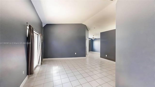 14723 SW 155th Pl, Miami, FL 33196 - unfurnished room with lofted ceiling, light tile patterned flooring, and baseboards
