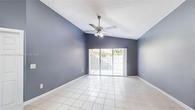 14723 SW 155th Pl, Miami, FL 33196 - spare room with vaulted ceiling, a ceiling fan, baseboards, a textured ceiling, and light tile patterned floors