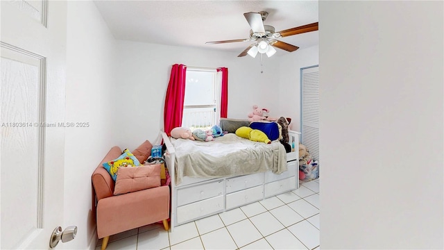 14723 SW 155th Pl, Miami, FL 33196 - bedroom with light tile patterned floors and a ceiling fan