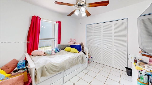 14723 SW 155th Pl, Miami, FL 33196 - bedroom with light tile patterned floors and a ceiling fan