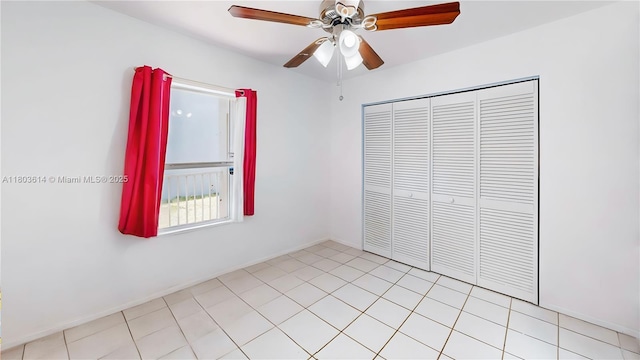 14723 SW 155th Pl, Miami, FL 33196 - unfurnished bedroom featuring a closet, a ceiling fan, and baseboards