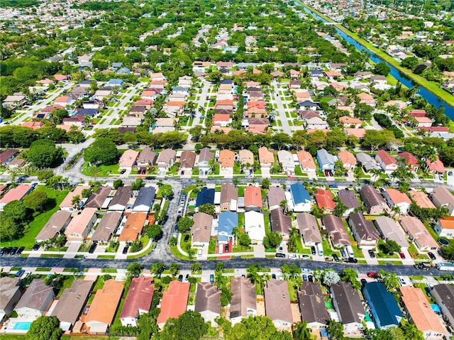 14723 SW 155th Pl, Miami, FL 33196 - aerial view of property and surrounding area with a large body of water and nearby suburban area
