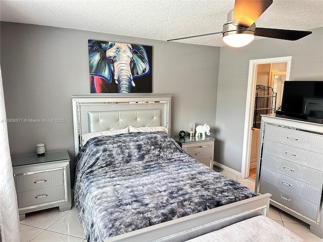 301 SW 86th Ave Unit 208, Pembroke Pines, FL 33025 - bedroom with a textured ceiling and a ceiling fan