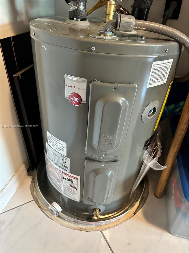 301 SW 86th Ave Unit 208, Pembroke Pines, FL 33025 - utility room with electric water heater