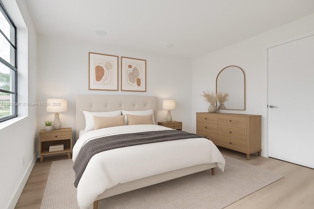 235 SW 3rd Ct, Deerfield Beach, FL 33441 - bedroom with light wood-style floors