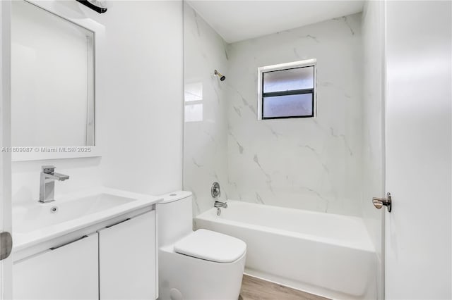 235 SW 3rd Ct, Deerfield Beach, FL 33441 - full bathroom featuring vanity, toilet, bathtub / shower combination, and wood finished floors