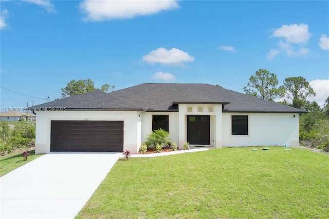 637 Cardinal St E, Lehigh Acres, FL 33974 - view of front of property with stucco siding, an attached garage, a front yard, and concrete driveway