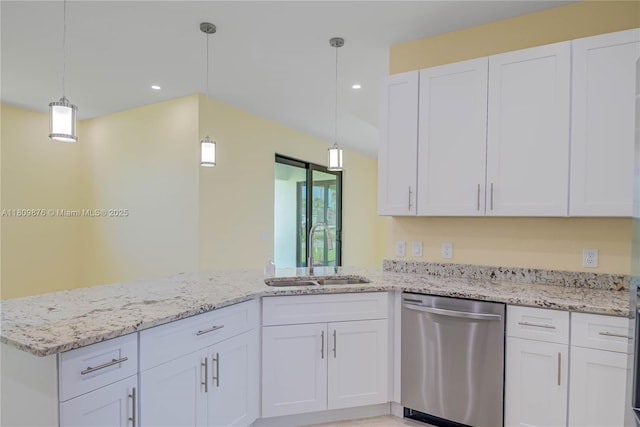 637 Cardinal St E, Lehigh Acres, FL 33974 - kitchen featuring stainless steel dishwasher, a sink, a peninsula, white cabinetry, and recessed lighting
