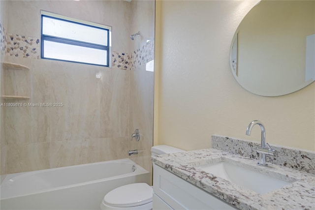 637 Cardinal St E, Lehigh Acres, FL 33974 - full bath with toilet, tub / shower combination, and vanity
