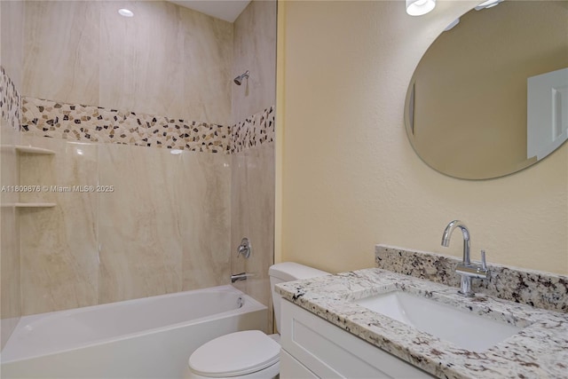 637 Cardinal St E, Lehigh Acres, FL 33974 - bathroom with bathtub / shower combination, vanity, and toilet
