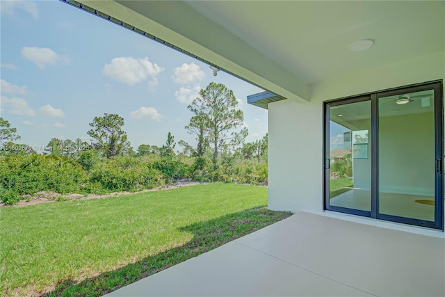 637 Cardinal St E, Lehigh Acres, FL 33974 - view of grassy yard with a patio area