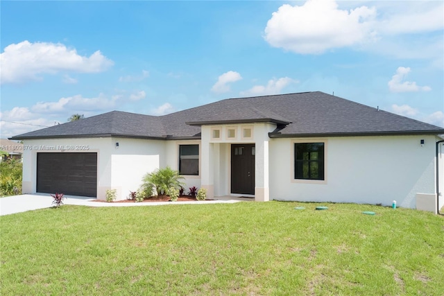 637 Cardinal St E, Lehigh Acres, FL 33974 - view of front of home with an attached garage, roof with shingles, stucco siding, and a front lawn
