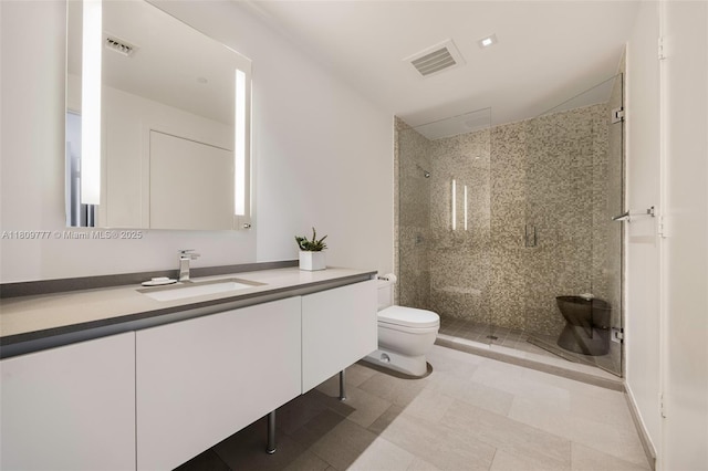 68 SE 6th St Unit 1703, Miami, FL 33131 - full bath featuring toilet, a stall shower, and vanity