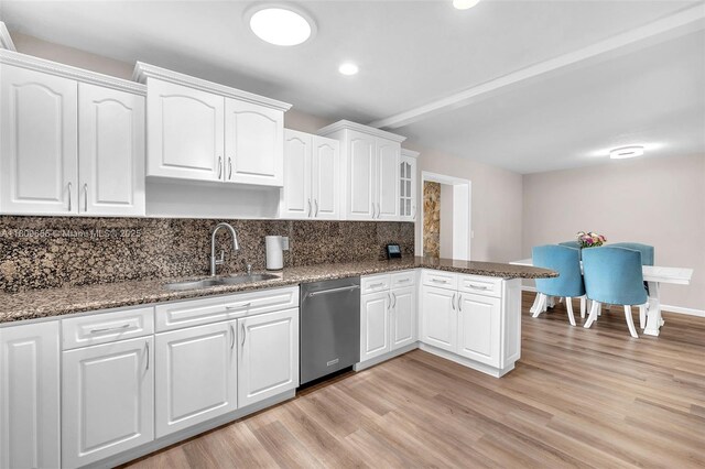 4271 SW 67th Ter, Davie, FL 33314 - kitchen with dishwasher, a sink, a peninsula, white cabinets, and light wood finished floors