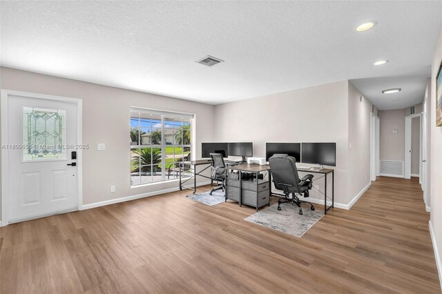 4271 SW 67th Ter, Davie, FL 33314 - home office with wood finished floors, baseboards, a textured ceiling, and recessed lighting