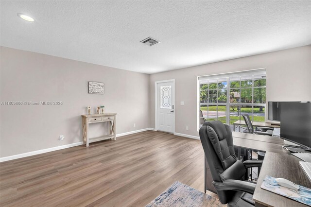 4271 SW 67th Ter, Davie, FL 33314 - office with wood finished floors, a textured ceiling, baseboards, and recessed lighting