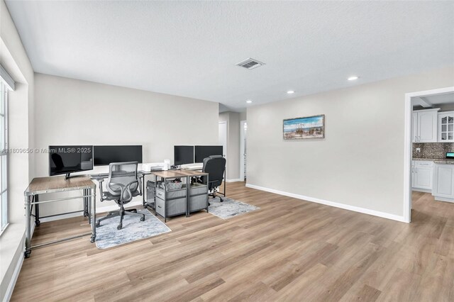 4271 SW 67th Ter, Davie, FL 33314 - office with light wood-type flooring, baseboards, recessed lighting, and a textured ceiling