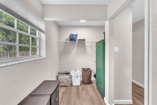 4271 SW 67th Ter, Davie, FL 33314 - walk in closet featuring wood finished floors
