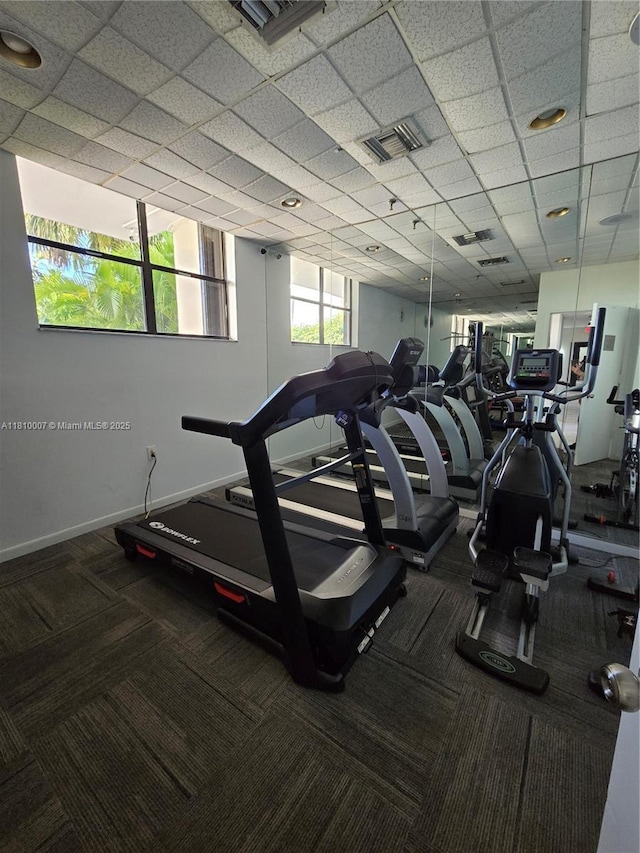 900 NE 195th St Unit 709, Miami, FL 33179 - exercise room with carpet flooring and baseboards