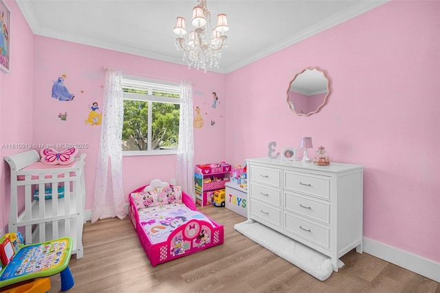 17306 SW 139th Ct, Miami, FL 33177 - bedroom with a chandelier, light wood-style flooring, crown molding, and baseboards