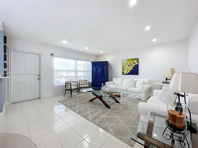 708 SE 7th Ave Unit 14, Pompano Beach, FL 33060 - living area featuring light tile patterned flooring, recessed lighting, and baseboards