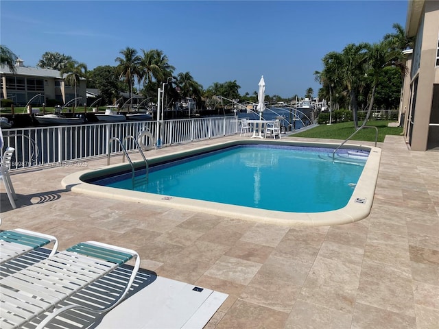 708 SE 7th Ave Unit 14, Pompano Beach, FL 33060 - community pool featuring a patio area and a water view