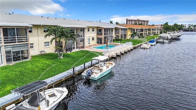 708 SE 7th Ave Unit 14, Pompano Beach, FL 33060 - dock area with a water view and a yard