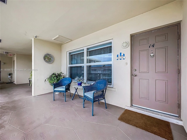 708 SE 7th Ave Unit 14, Pompano Beach, FL 33060 - property entrance with stucco siding and a surveillance system