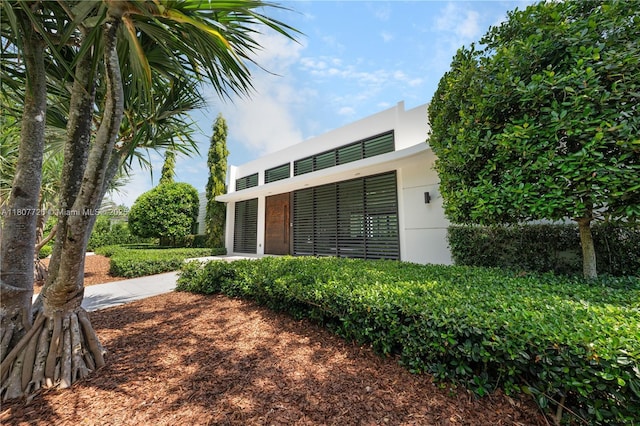 9450 SW 98th St, Miami, FL 33176 - rear view of property featuring stucco siding