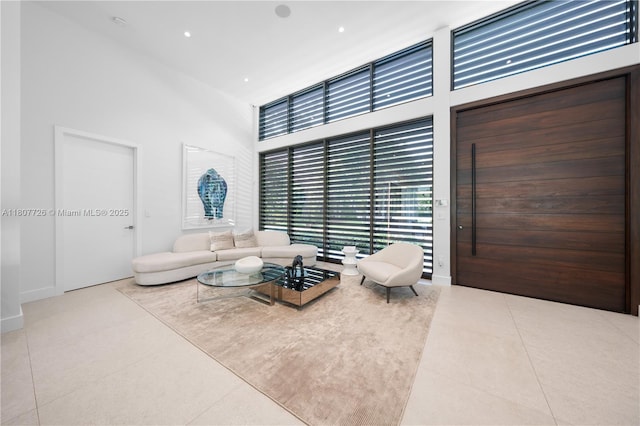 9450 SW 98th St, Miami, FL 33176 - tiled living area featuring a towering ceiling