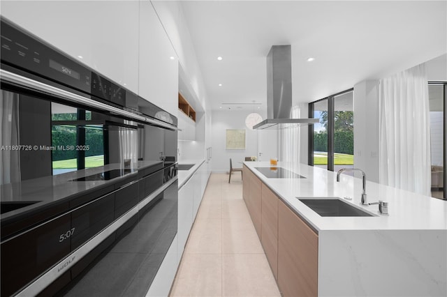 9450 SW 98th St, Miami, FL 33176 - kitchen featuring modern cabinets, a sink, white cabinetry, light tile patterned flooring, and a spacious island