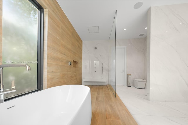 9450 SW 98th St, Miami, FL 33176 - full bath featuring tile walls, a freestanding bath, toilet, and wood walls
