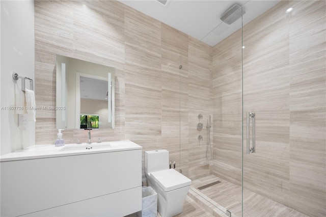 9450 SW 98th St, Miami, FL 33176 - bathroom with a shower stall, vanity, tile walls, and toilet