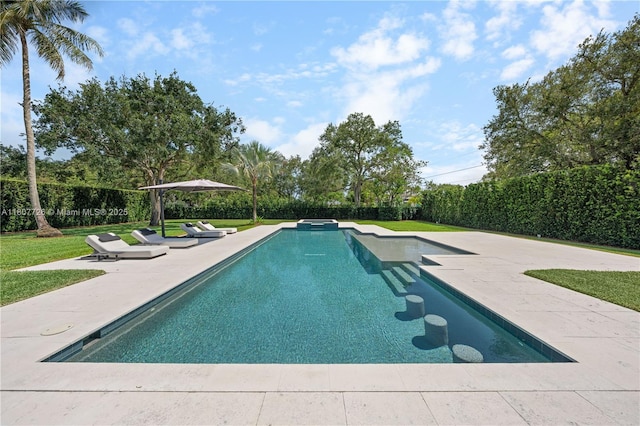 9450 SW 98th St, Miami, FL 33176 - view of pool featuring a patio, a yard, and a pool with connected hot tub
