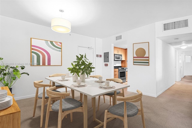 10275 Collins Ave Unit 1506, Bal Harbour, FL 33154 - dining room with light colored carpet and electric panel