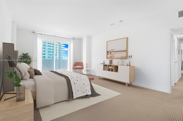 10275 Collins Ave Unit 1506, Bal Harbour, FL 33154 - bedroom with light carpet and access to outside