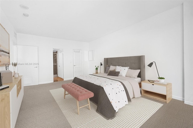 10275 Collins Ave Unit 1506, Bal Harbour, FL 33154 - bedroom with carpet floors and a spacious closet