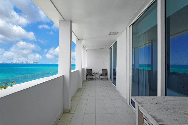 10275 Collins Ave Unit 1506, Bal Harbour, FL 33154 - balcony featuring view of water and beach