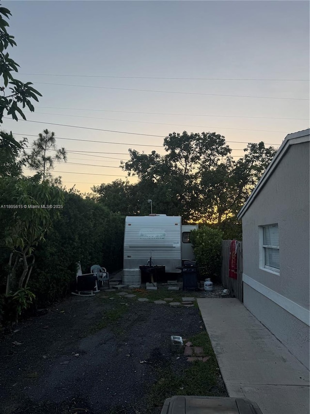 1929 SW 50th Ave, Fort Lauderdale, FL 33317 - view of yard at dusk