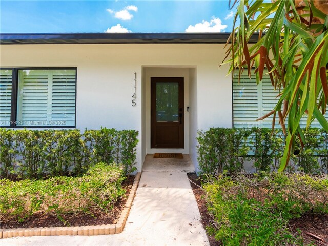 11145 SW 126th St, Miami, FL 33176 - property entrance featuring stucco siding