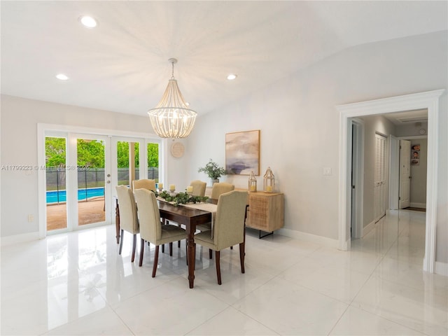 11145 SW 126th St, Miami, FL 33176 - dining room with a chandelier, french doors, baseboards, recessed lighting, and lofted ceiling