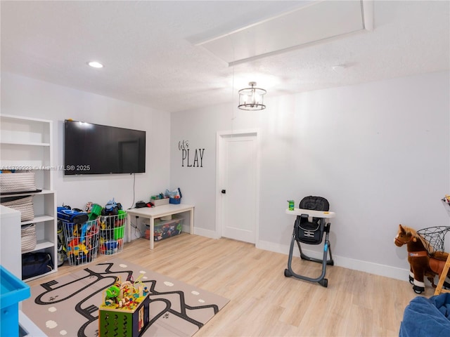 11145 SW 126th St, Miami, FL 33176 - living room with attic access, wood finished floors, and baseboards