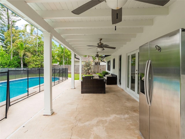 11145 SW 126th St, Miami, FL 33176 - fenced backyard featuring french doors, ceiling fan, a patio, and an outdoor hangout area